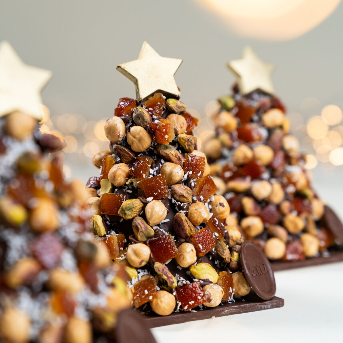 Small milk chocolate tree with nuts and candied fruits